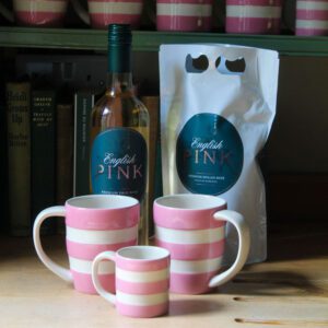 Bottle and pouch of English Pink rose wine with mugs